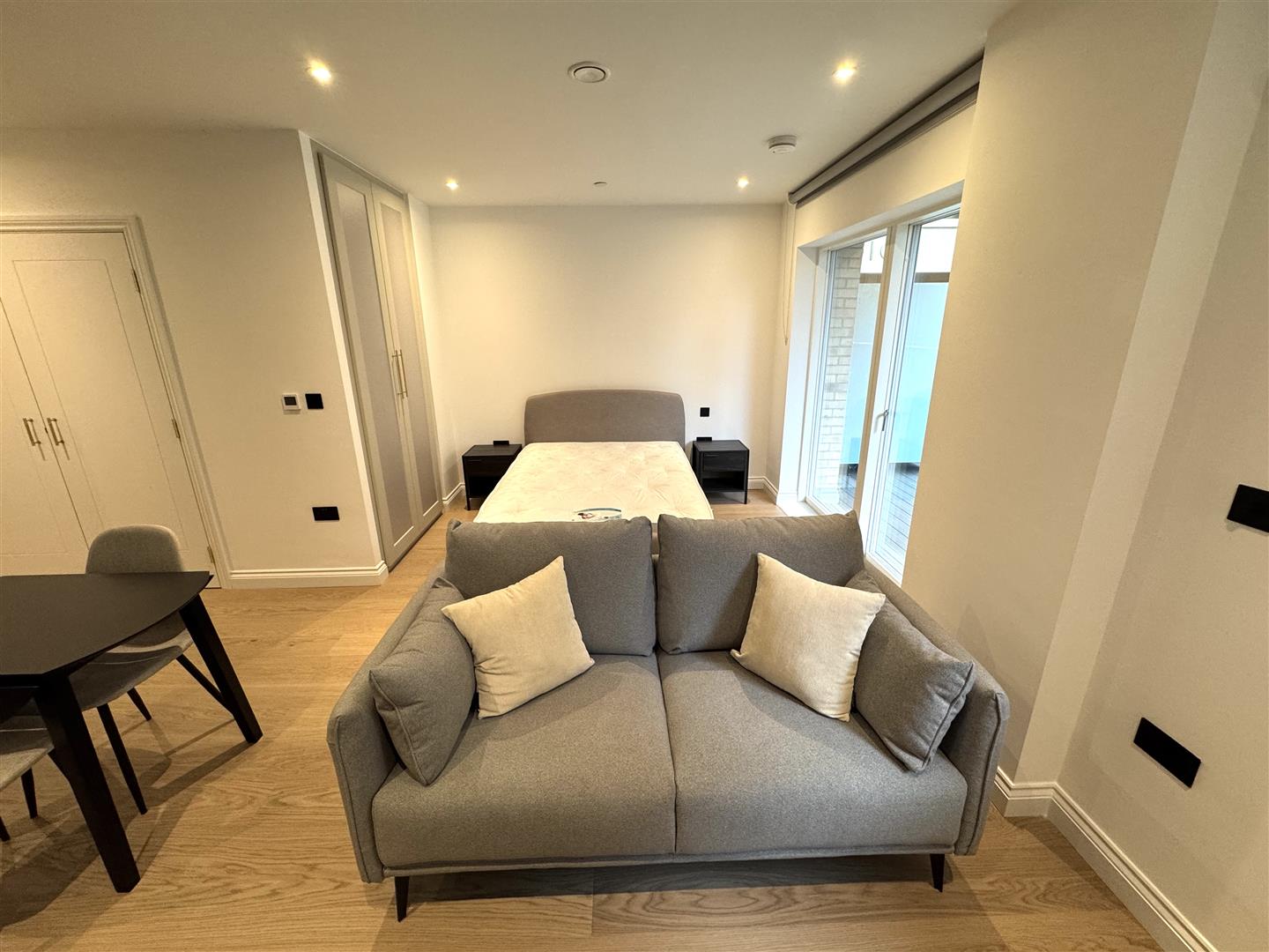 Living area with blind pic 6.jpeg